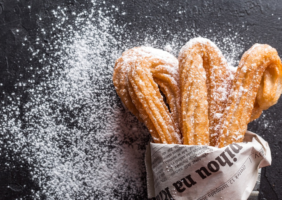 Churro's wrapped in newspaper