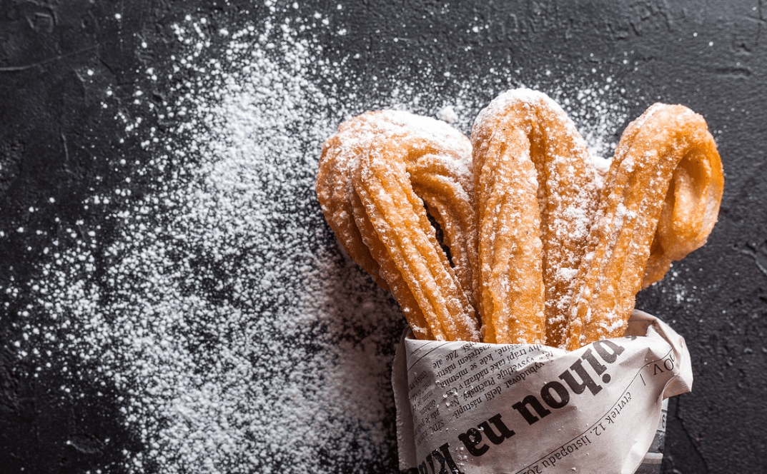 Churro's wrapped in newspaper