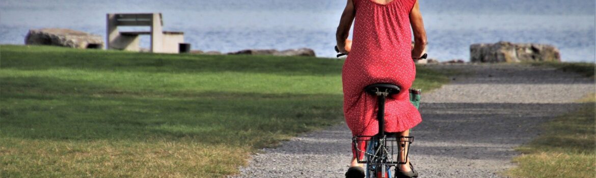 Elderly woman on a bicycle