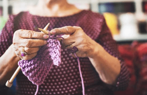 Lady knitting as a hobby