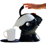 Pouring the Uccello Kettle into cup on the Uccello Grip Mat