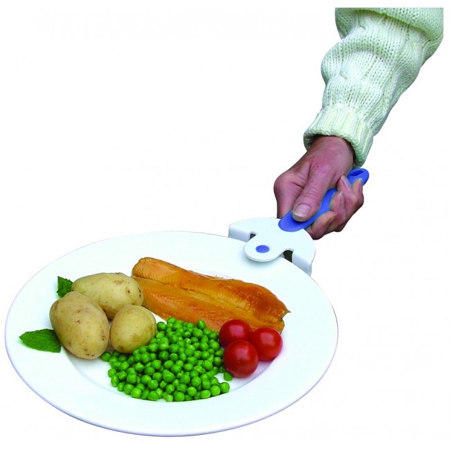 coolhand plate gripper in use - woman carrying dinner plate with coolhand gripper