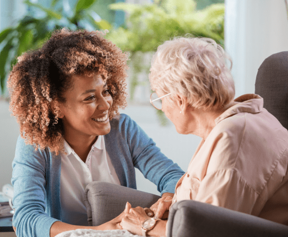 Nurse caring for elderly woman