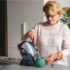 Elderly woman using the tilt-to-pour Uccello Kettle